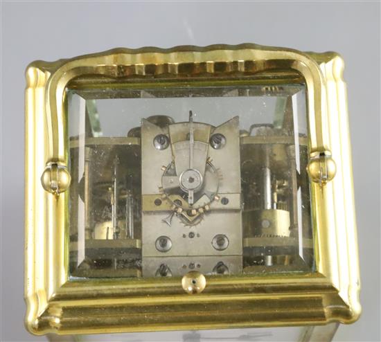 A late 19th century French ormolu quarter repeating carriage alarm clock, 6in.